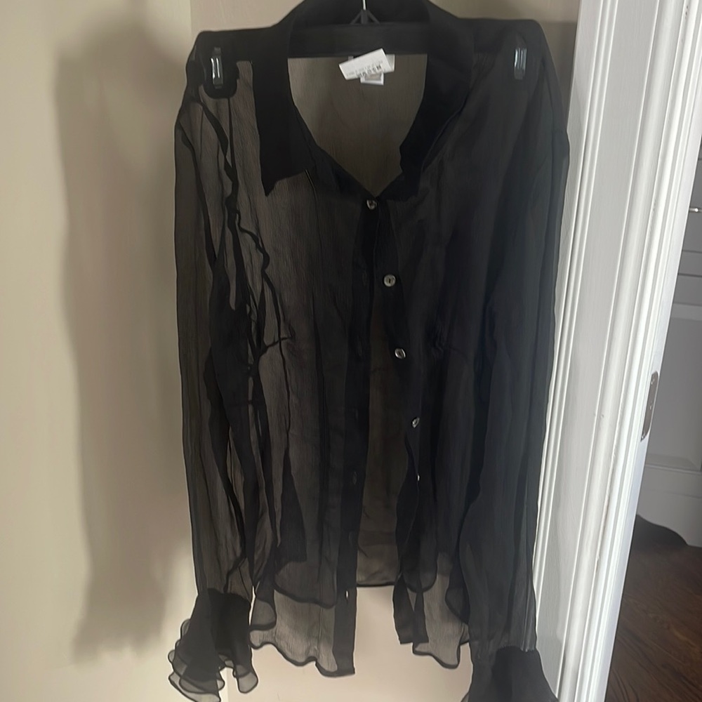 Sheer black button up shirt for any occasion. Can be styled with a sexy bra